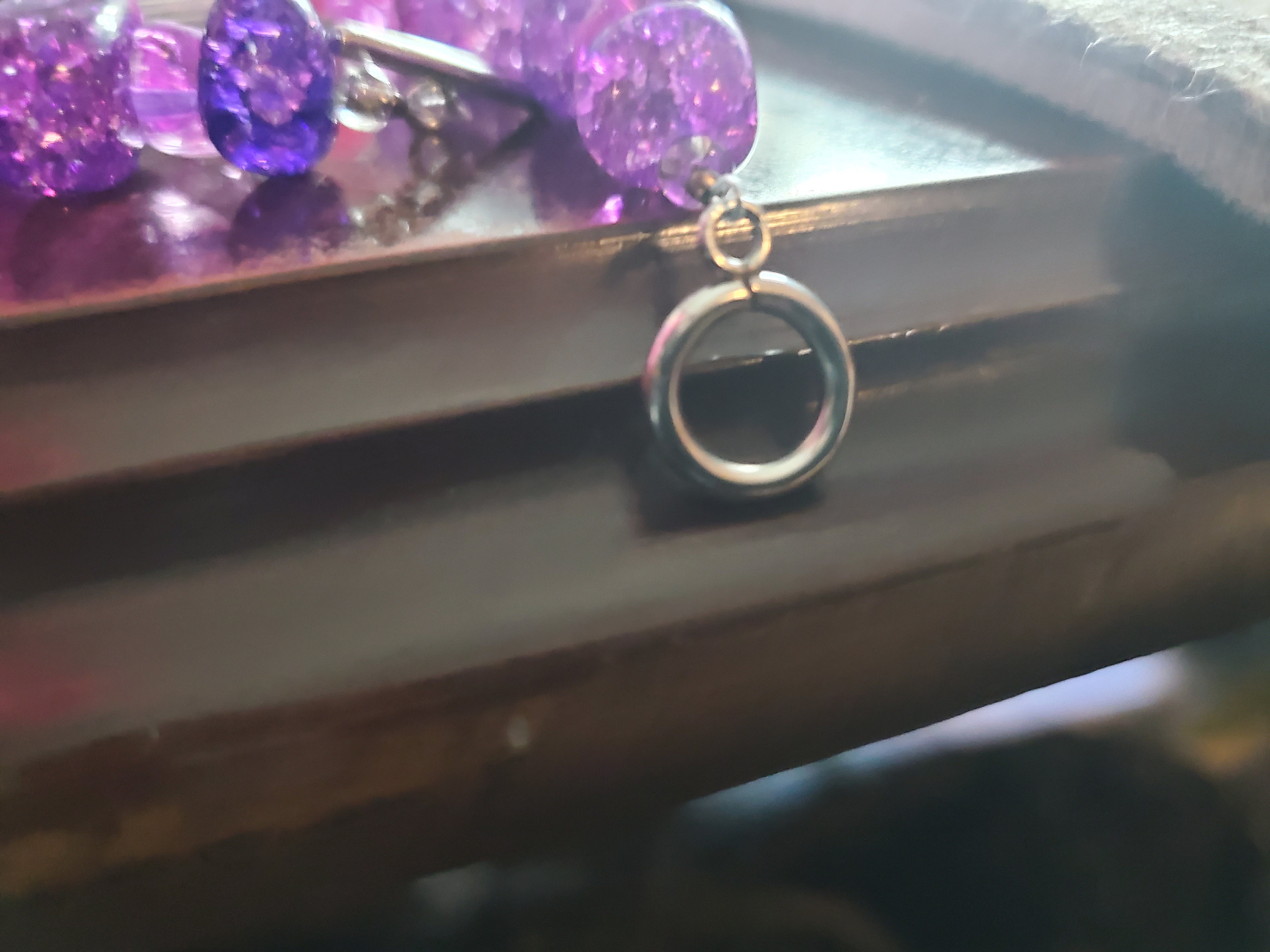 Funky purple beaded bracelet w/ toggle closure.