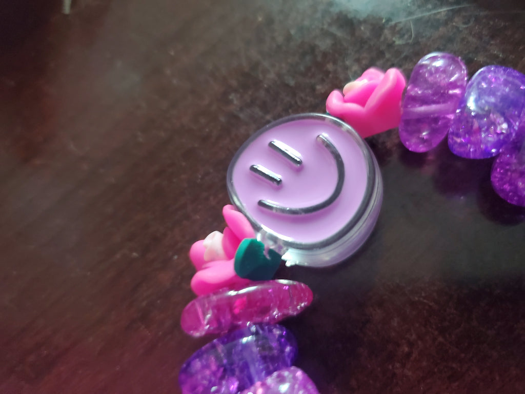 Funky purple beaded bracelet w/ toggle closure.