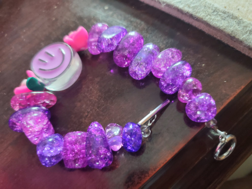 Funky purple beaded bracelet w/ toggle closure.
