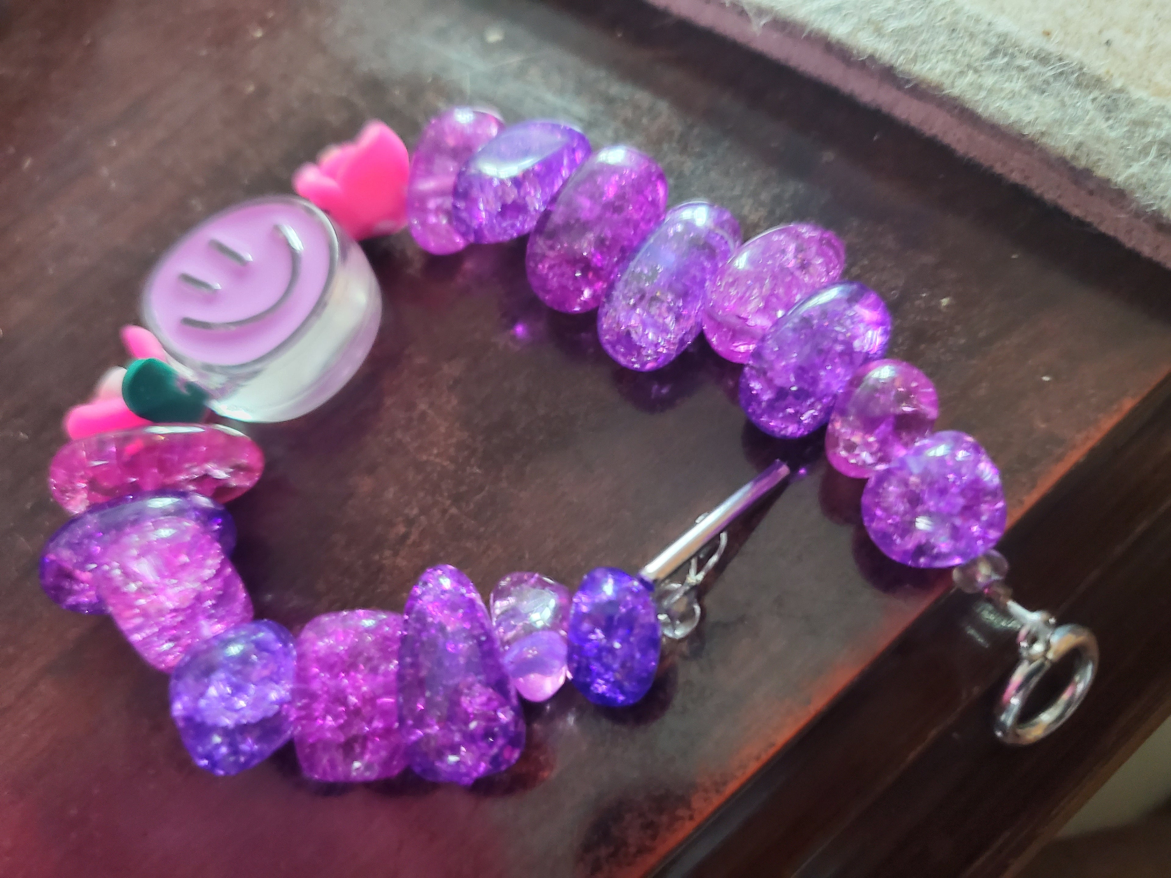 Funky purple beaded bracelet w/ toggle closure.