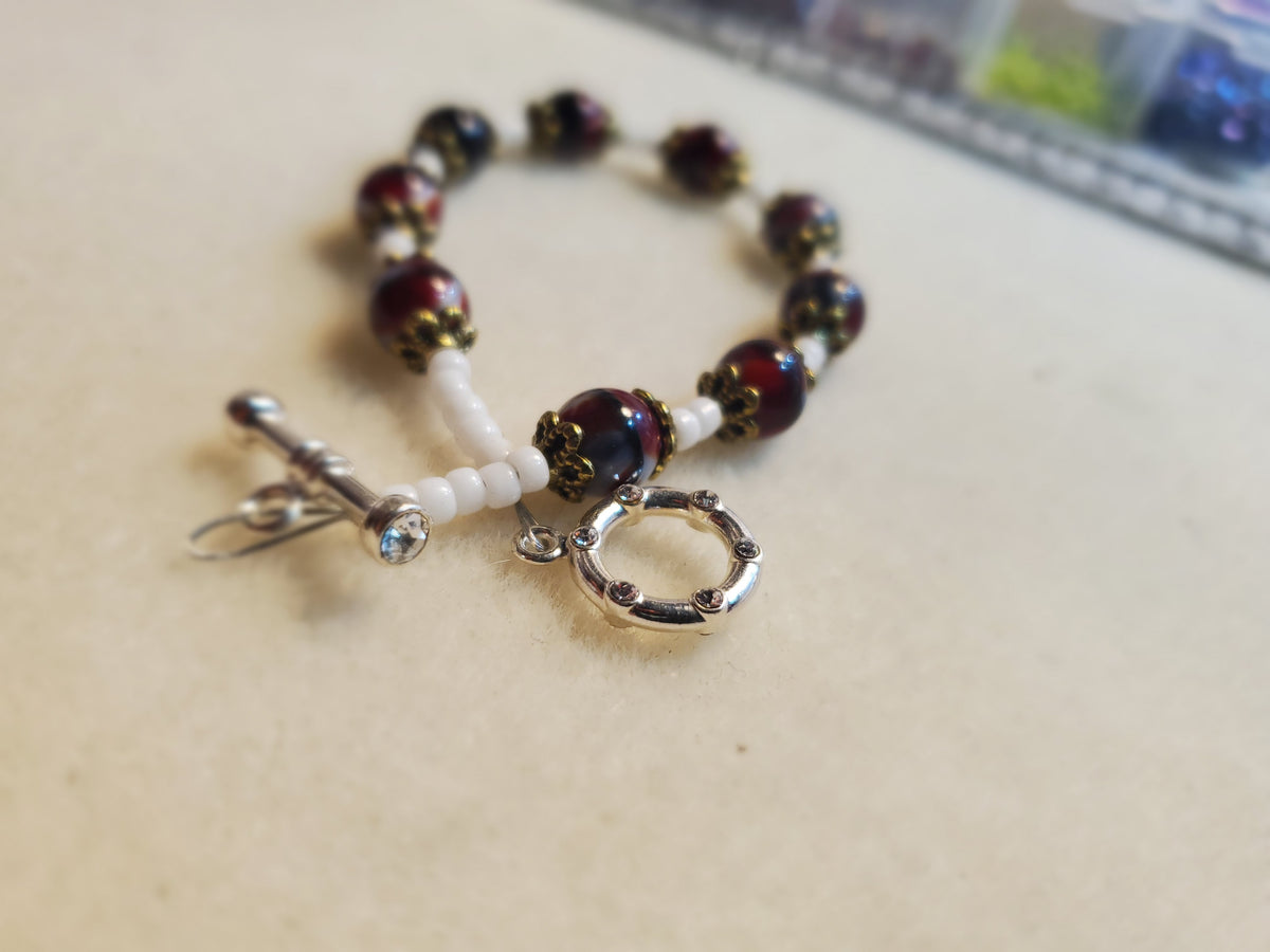 Dark red and white beaded necklace and bracelet set