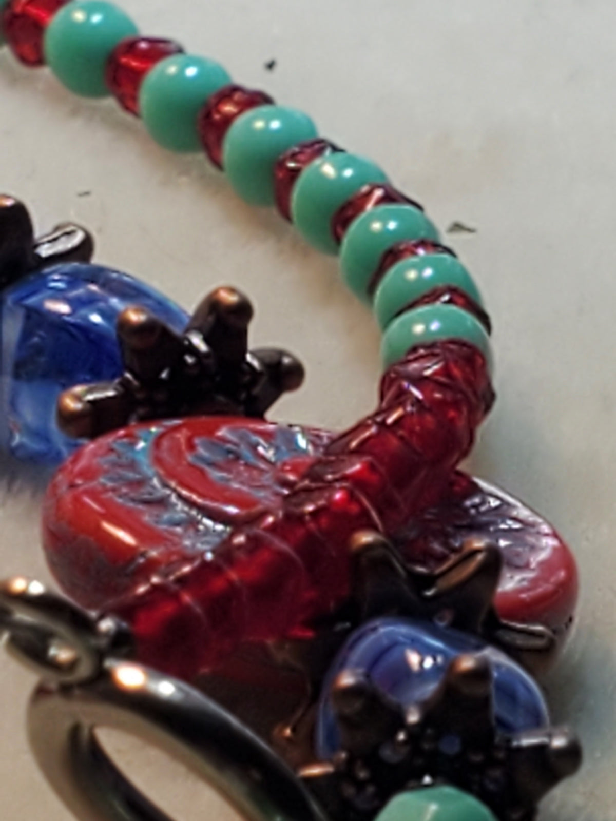 Red floral pendant
