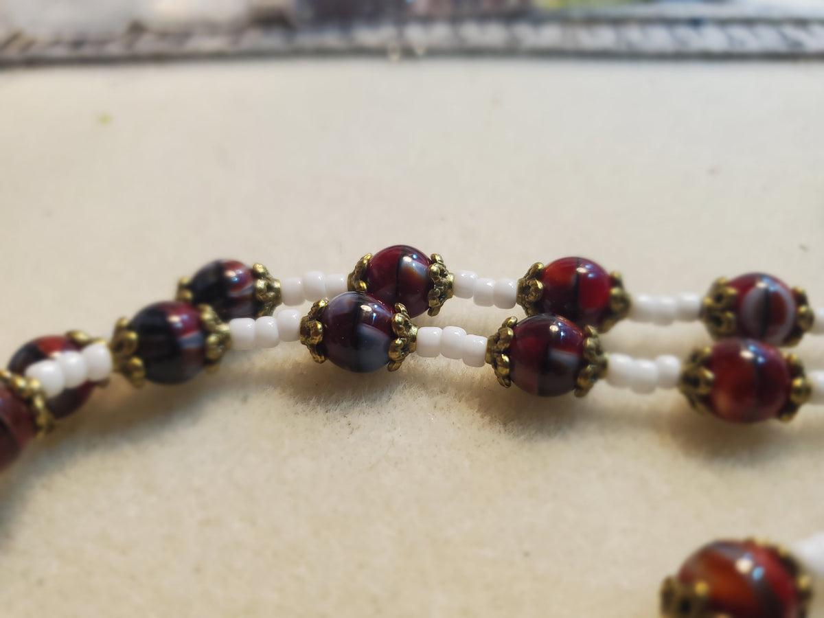 Dark red and white beaded necklace and bracelet set