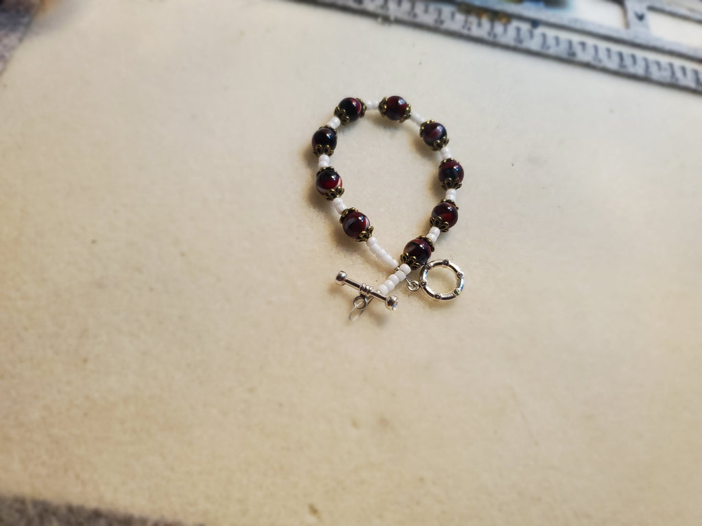 Dark red and white beaded necklace and bracelet set