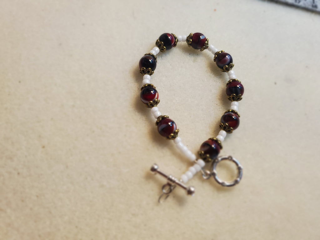 Dark red and white beaded necklace and bracelet set
