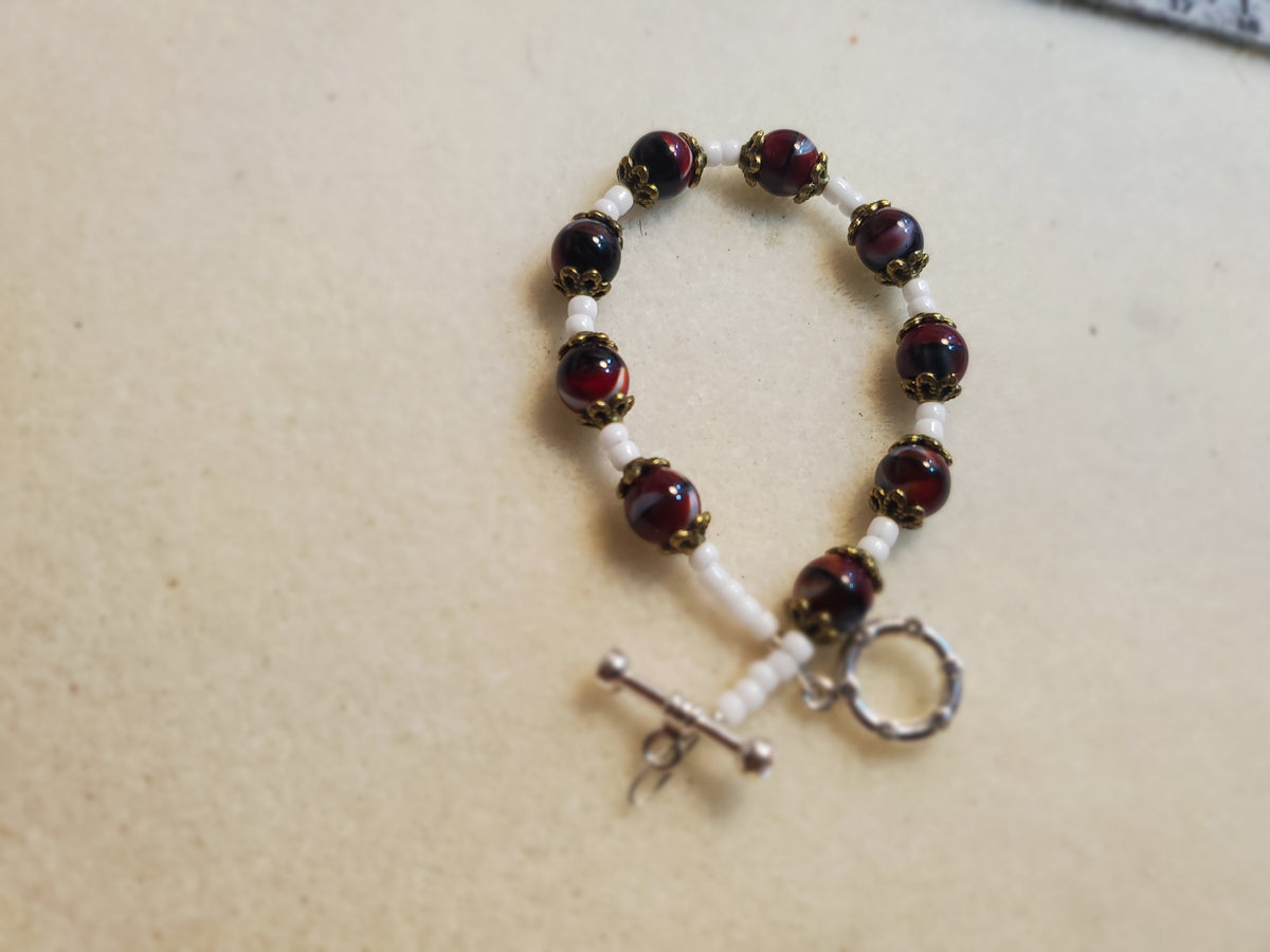 Dark red and white beaded necklace and bracelet set