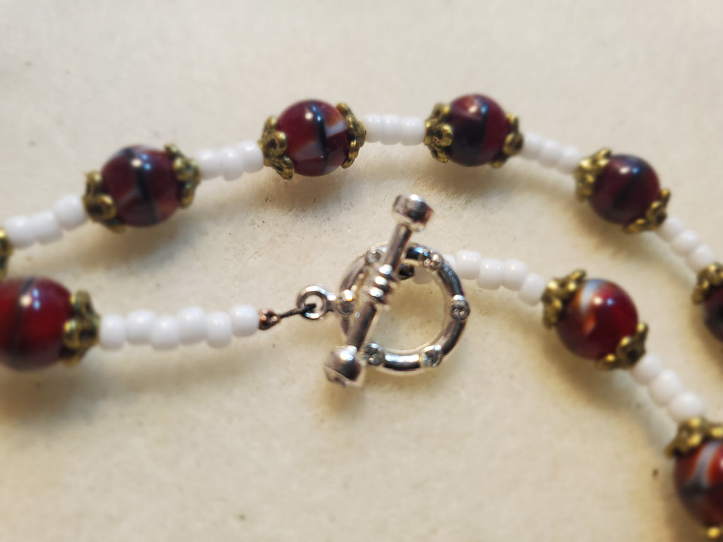 Dark red and white beaded necklace and bracelet set