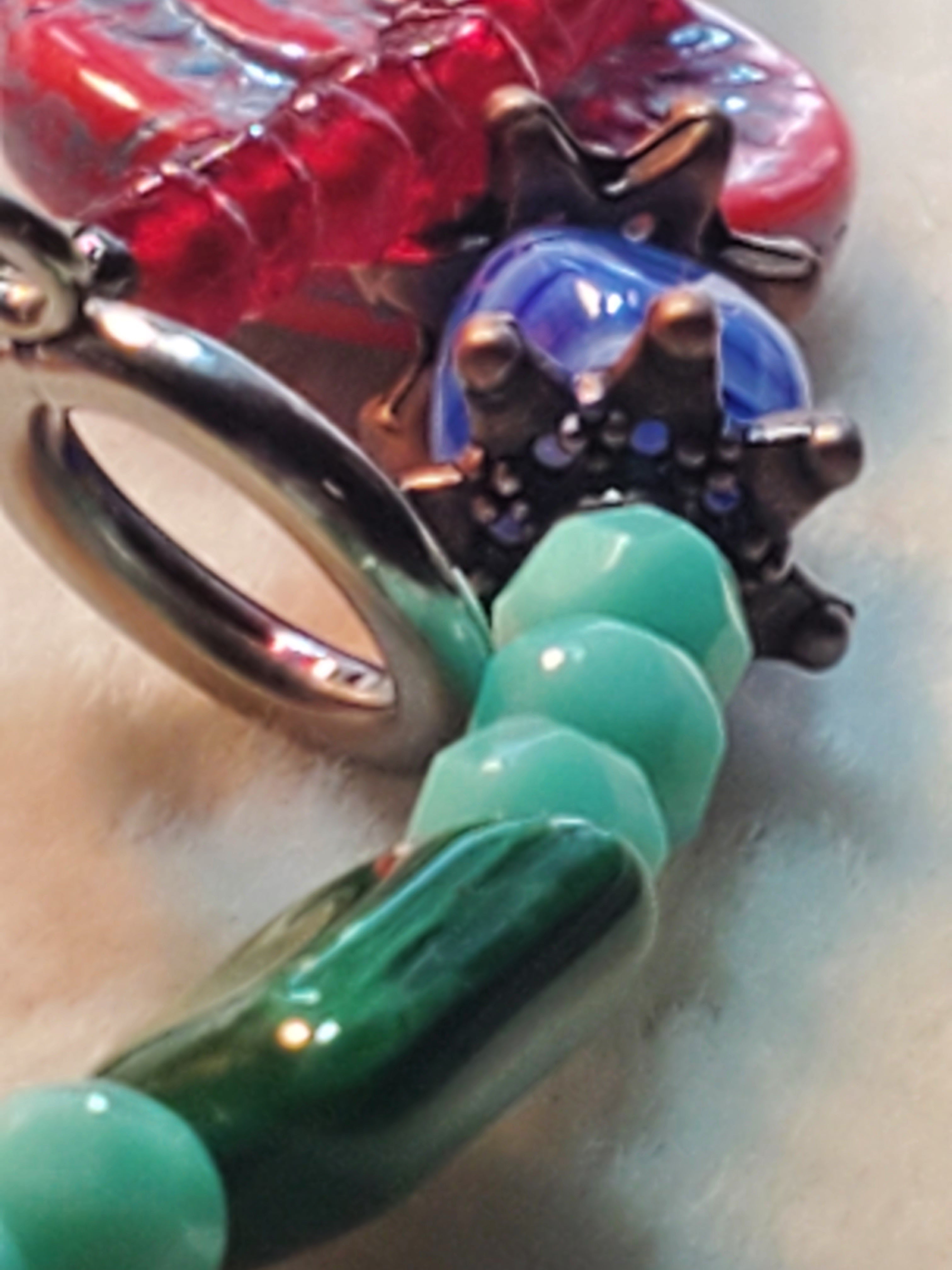 Red floral pendant